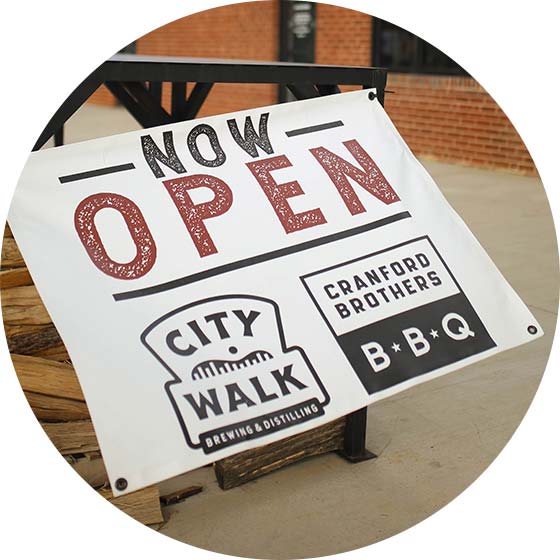 Cranford Brothers BBQ and City Walk Brewing & Distillery sign photo